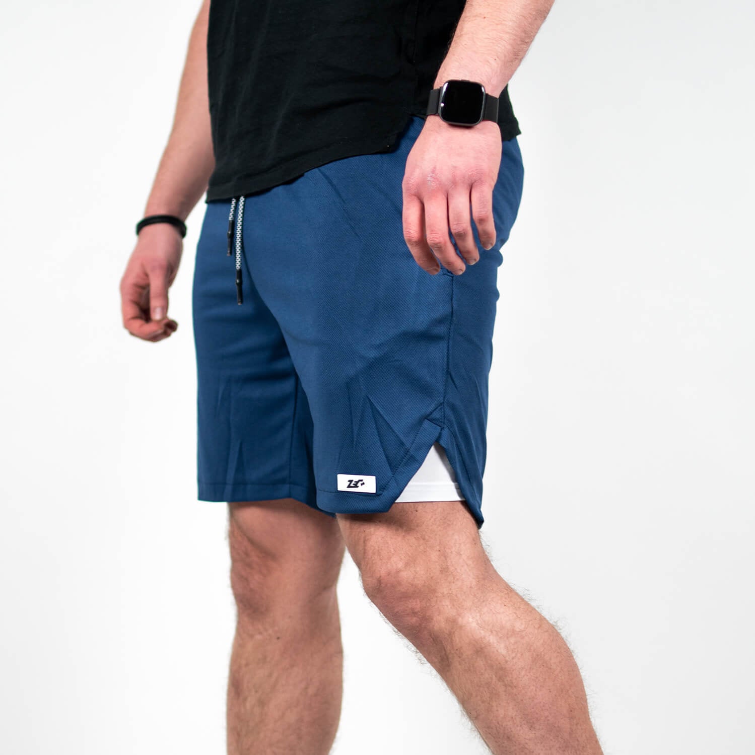 Zec+ Dual Shorts Herren in Dunkelblau, Seitenansicht mit Logo-Detail